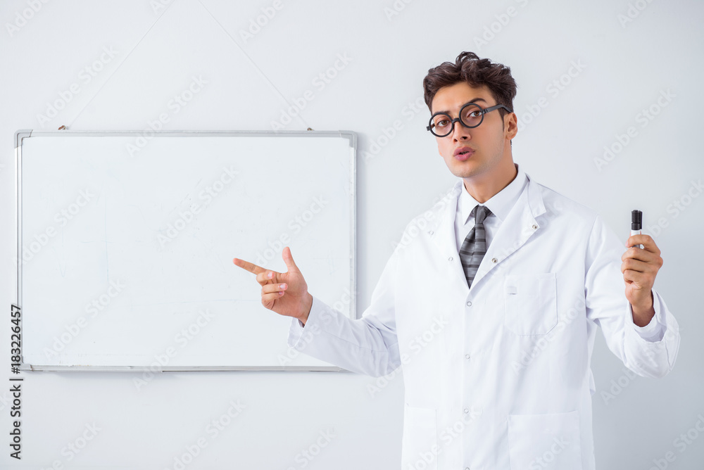 Funny doctor scientist making presentation in hospital Funny doctor scientist making presentation in hospital