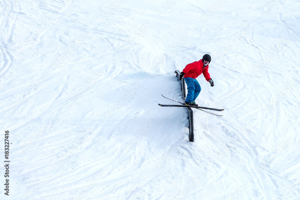 People are having fun in downhill skiing and snowboarding