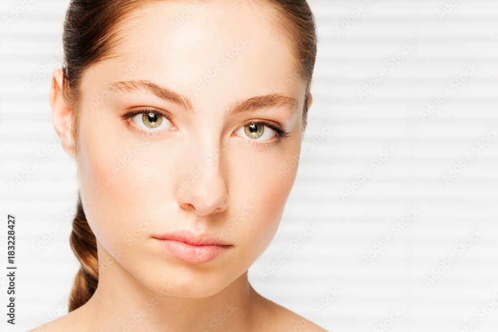 Attractive dark-haired woman with clean skin face Attractive dark-haired woman with clean skin face