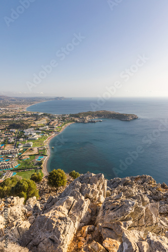 Stony landscape of Tsambika mountain and a view of Kolymbia, a small resort on the Rhodes Island, Greece. 