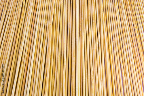 Fototapeta Naklejka Na Ścianę i Meble -  Wooden yellow bamboo mat texture abstract background.