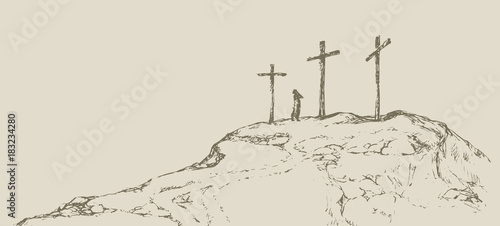 Three crosses stand on  light sky backdrop