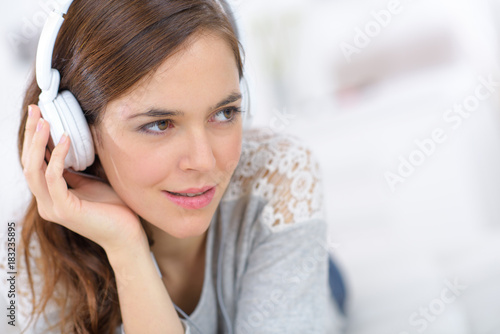 Lady listening to headphones