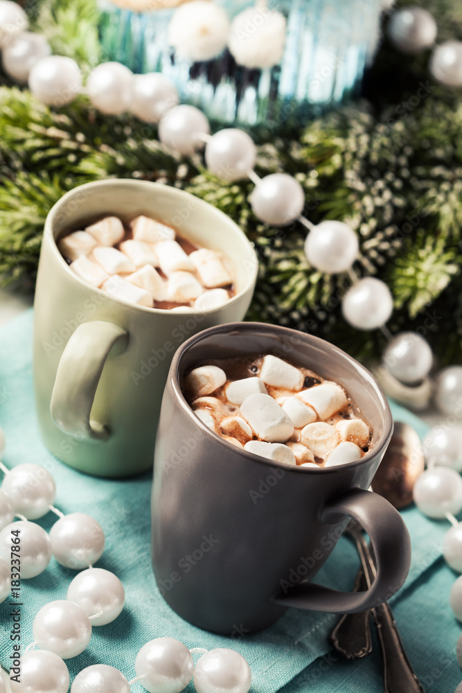 Hot chocolates with marshmallows in Christmas setup Hot chocolates with marshmallows in Christmas setup