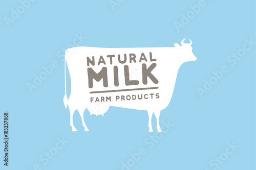 Emblem template with white silhouette of cow against blue background and sample text: natural milk and farm products. Image for milk stores, market, packaging and advertising. Vector illustration.