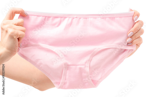 Female pink panties in hands