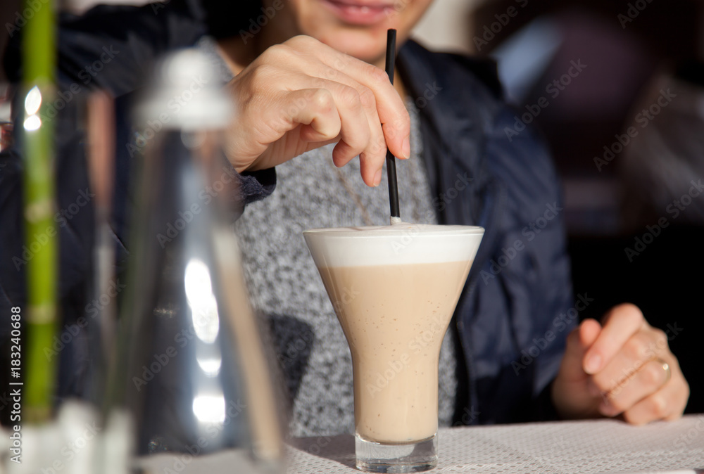 woman drinking caffe latte on terrace woman drinking caffe latte on terrace