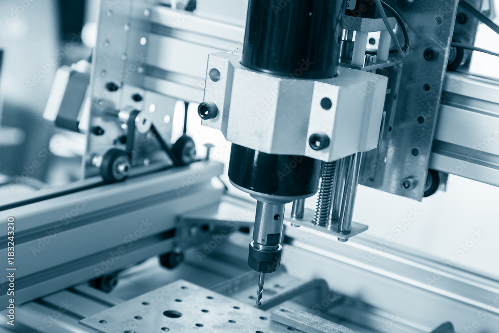 Obraz premium Milling machine working on steel detail.