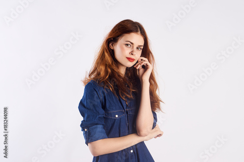 2046269 young woman, denim shirt, brown hair, light background, free space for copy