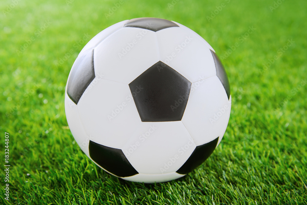 Soccer ball on green turf Soccer ball on green turf