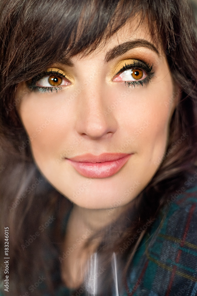 Beautiful large portrait of a girl with brown eyes and dark hair Beautiful large portrait of a girl with brown eyes and dark hair