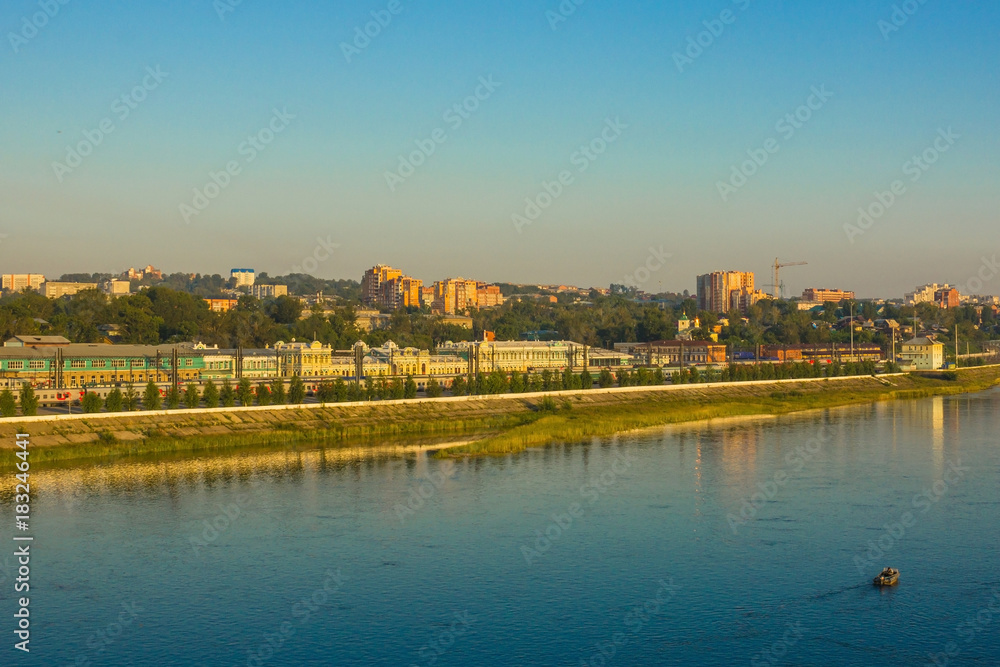 A modern city on the river bank.