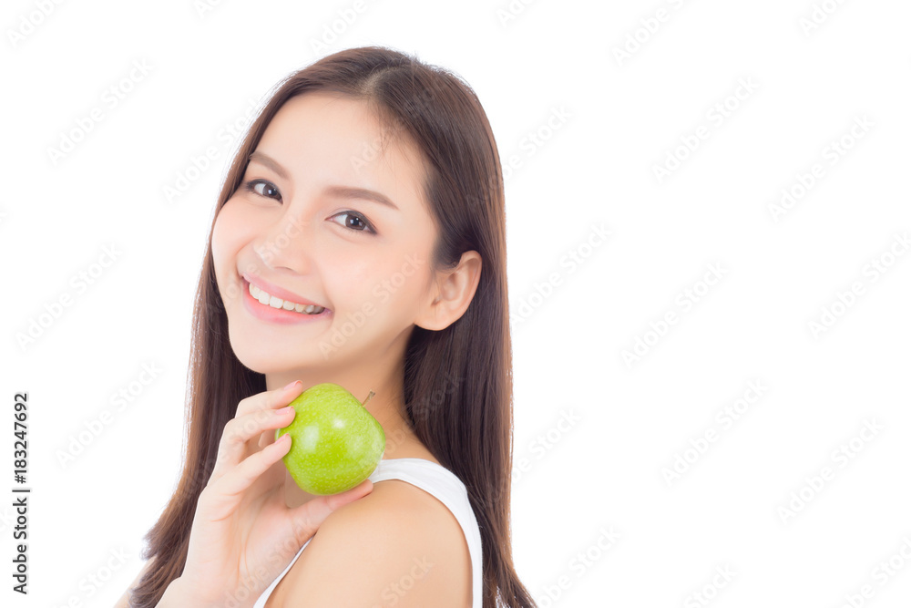 Beautiful young asian woman smile and holding green apple fruit with wellness and healthy isolated on white background. Beautiful young asian woman smile and holding green apple fruit with wellness and healthy isolated on white background.