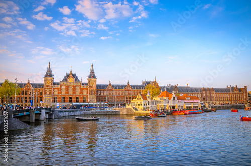 Photography Amsterdam Central Train Station at sunset, the Netherlands