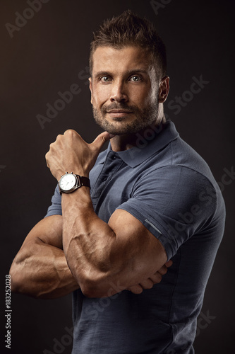 Muscular rich business man portrait