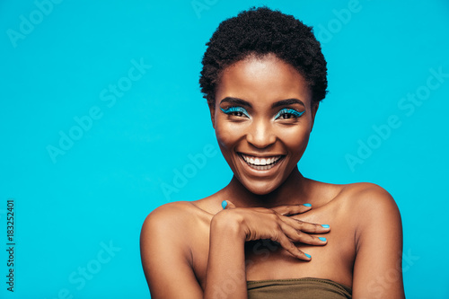 Beauty shot of woman with blue eye shadows