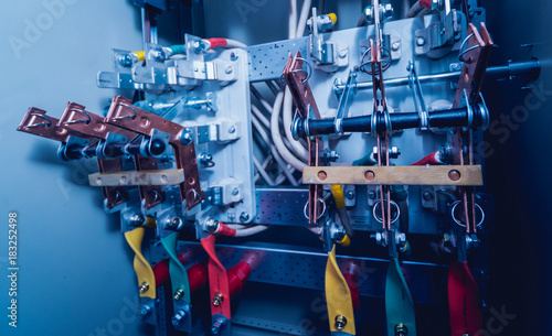 Wires and switches in electric box. Electrical panel with fuses and contactors