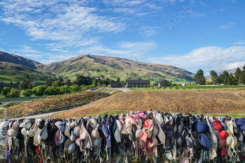 Otago / New Zealand - 28 October 2017: Editorial brassiere and lady bras at Cardrona Bra Fence for breast cancer campaign