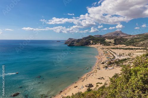 Stony landscape and a view of the Tsambika beach on the Rhodes Island  Greece