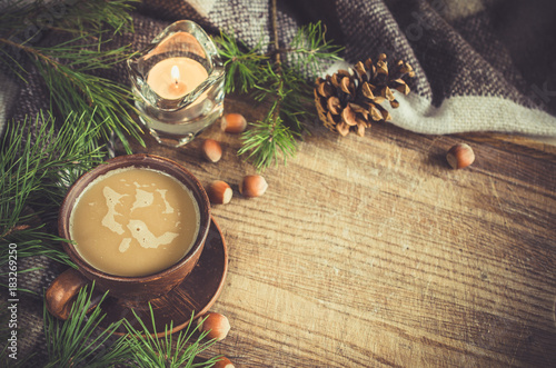 Hot cocoa, warm pleid and candle. Rustic life. photo