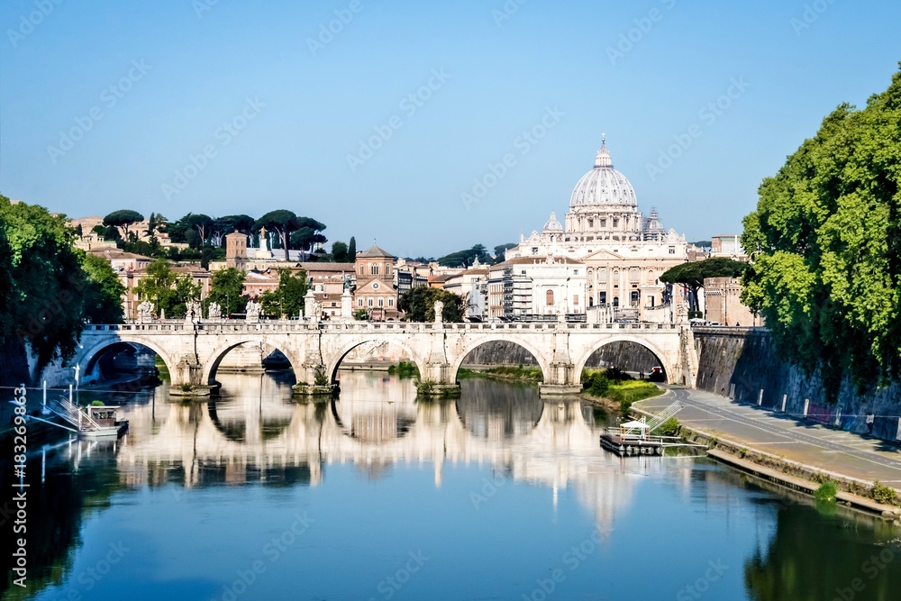 View to the St. Peter's basilica from the Tiber river in Rome, Italy.
