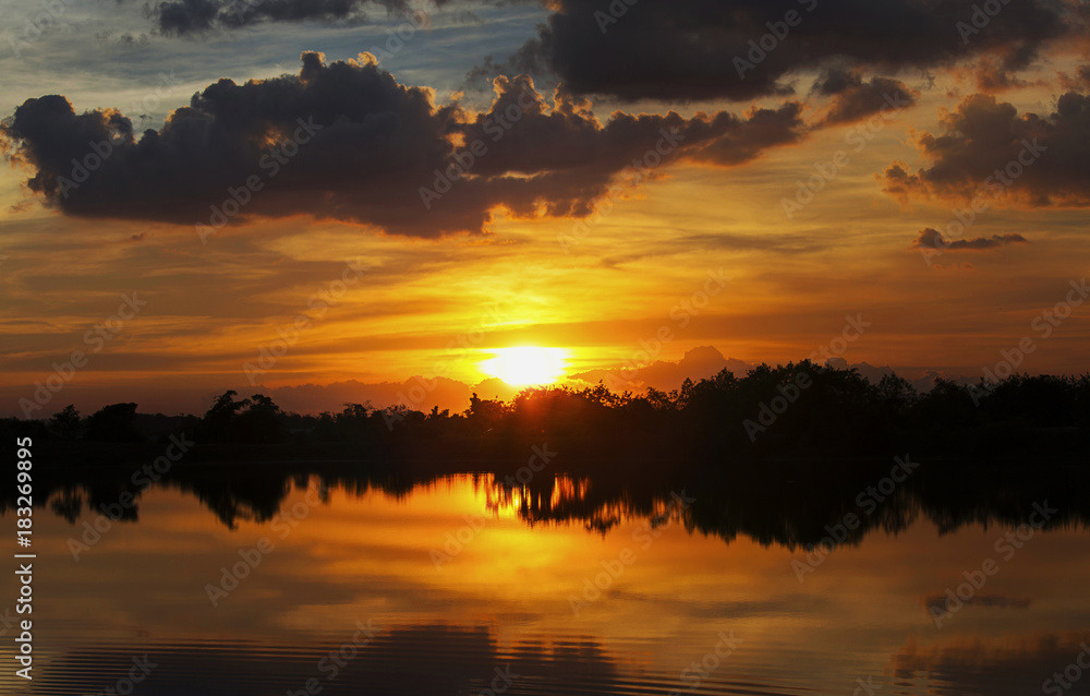 Sunset ship in sunset lake landscape