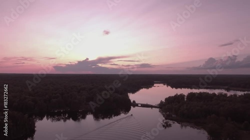 Wallpaper Mural Following pontoon boat heading home at sunset on lake McKellar from high point of view
UNGRADED DLOG FOOTAGE Torontodigital.ca