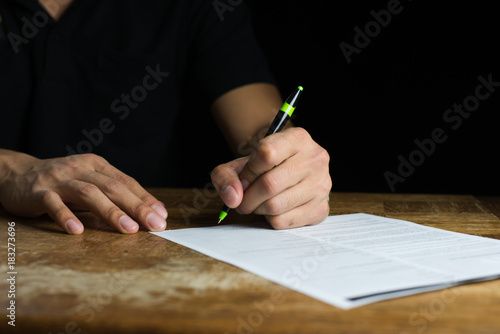 Businessman Signing a paper