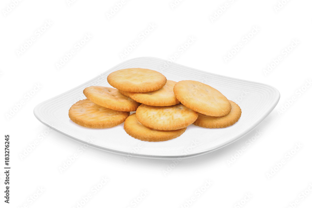biscuit crackers in the white plate isolated on white background biscuit crackers in the white plate isolated on white background