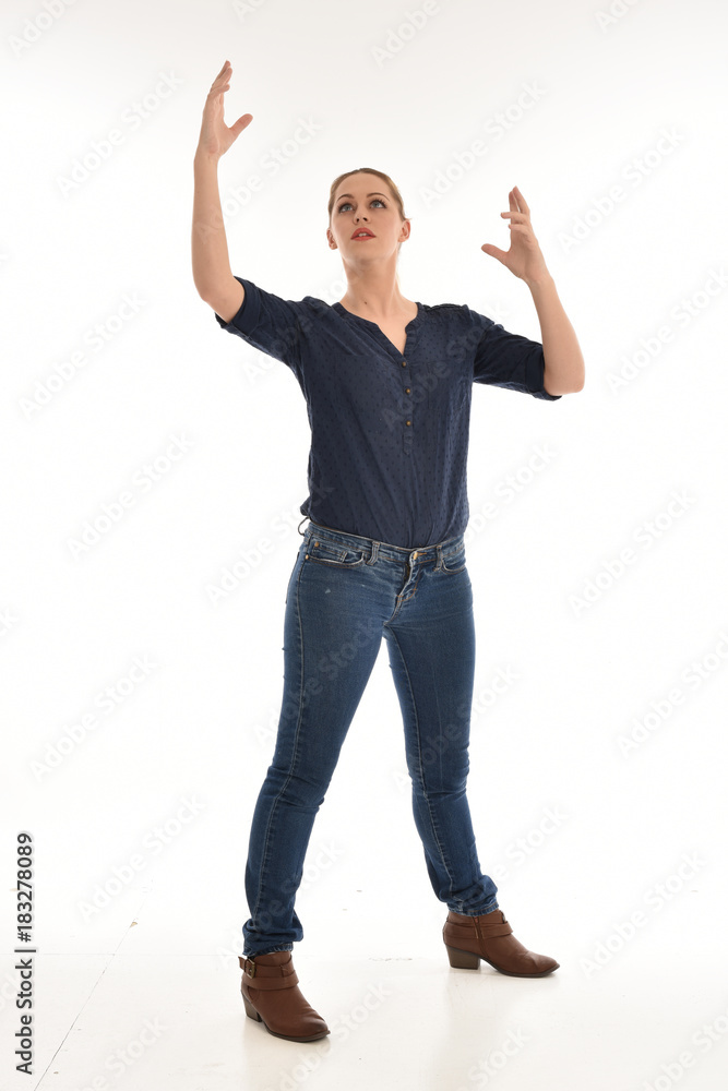 full length portrait of air wearing blue shirt and denim pants, standing pose on white background. full length portrait of air wearing blue shirt and denim pants, standing pose on white background.