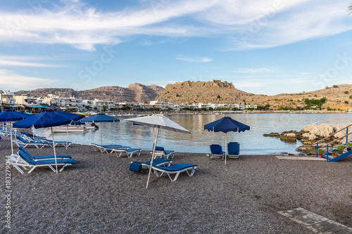 Haraki beach with quiet with crystal clear waters and boats, Rhodes, Greece   © dadamira