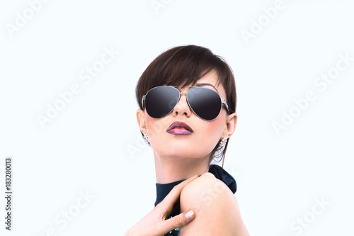 portrait of young woman in dark glasses.