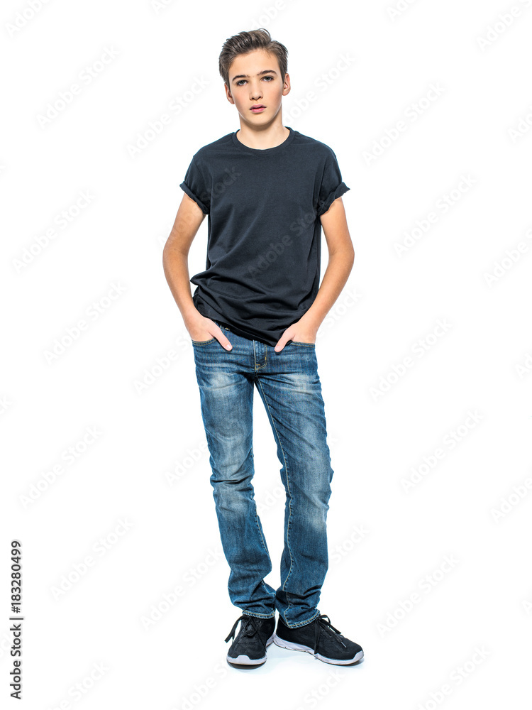 Photo of teenage handsome guy posing at studio Photo of teenage handsome guy posing at studio