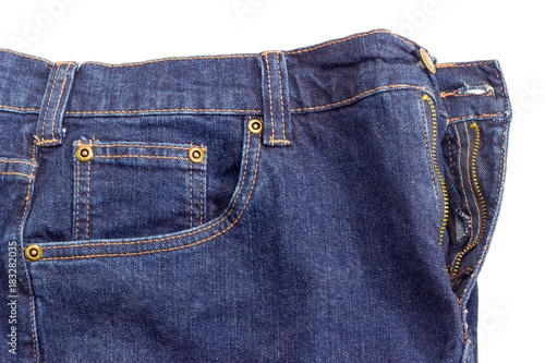 Fragment of the new dark blue jeans on white background