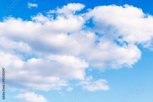 awesome fluffy clouds on blue sky.