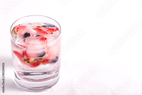 Wallpaper Mural Ice berries in glass of water Torontodigital.ca