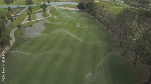 Aerial view of golf course sprinkler on fairway