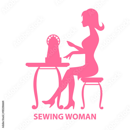 Woman sitting with sewing machine