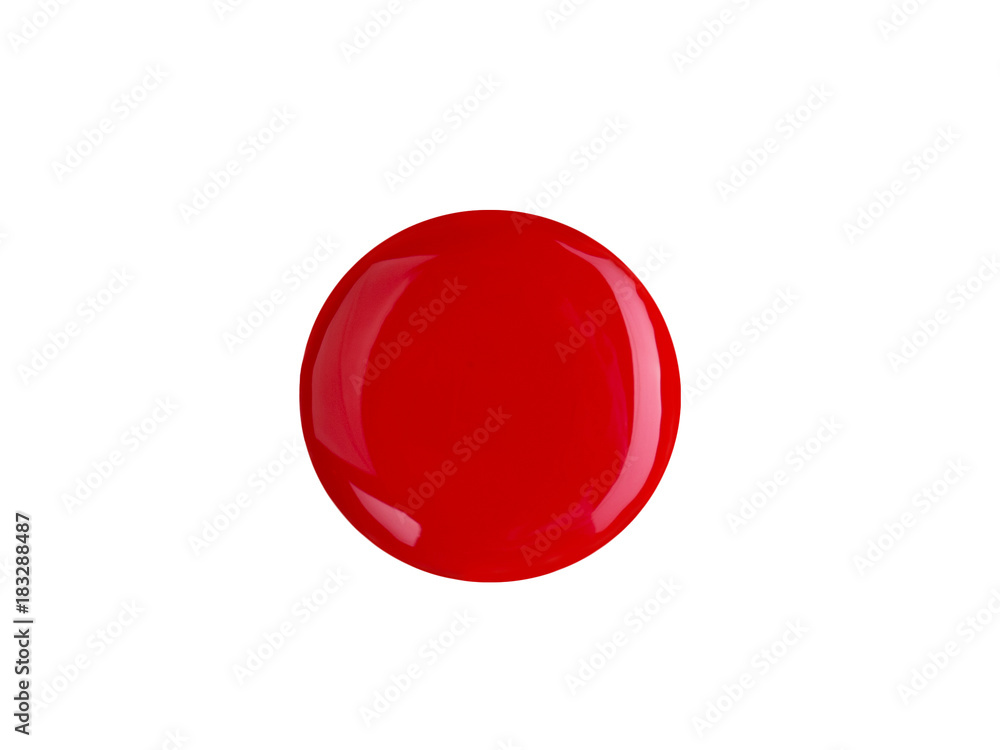 A drop of red nail polish on white A drop of red nail polish on white