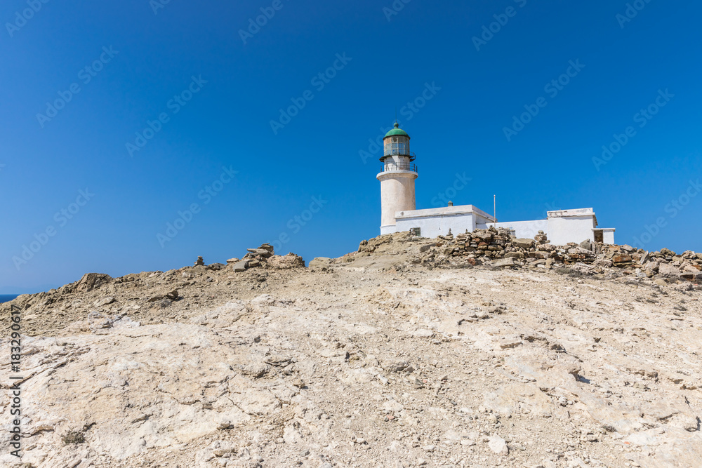 A white lighthouse in The Prasonisi National Park on the southern end of Rhodes in Greece A white lighthouse in The Prasonisi National Park on the southern end of Rhodes in Greece