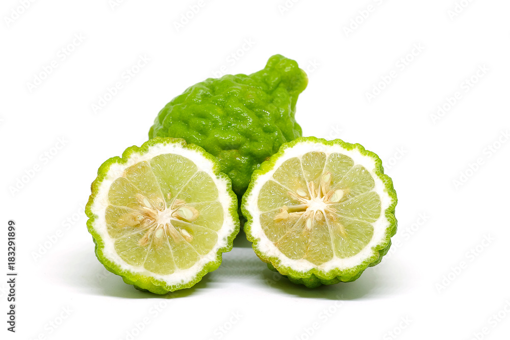 Fresh Green Bergamot or Leech Lime fruit slice on white background Fresh Green Bergamot or Leech Lime fruit slice on white background