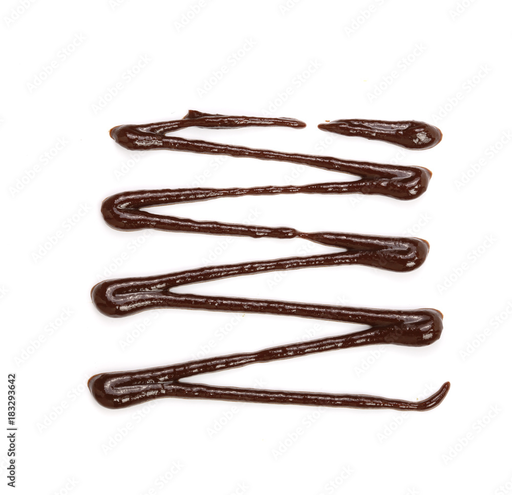 Hot melted chocolate pouring isolated on white background, top view Hot melted chocolate pouring isolated on white background, top view
