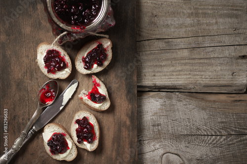 Sandwiches with butter and cranberry jam