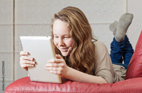 Teenager girl with tablet computer