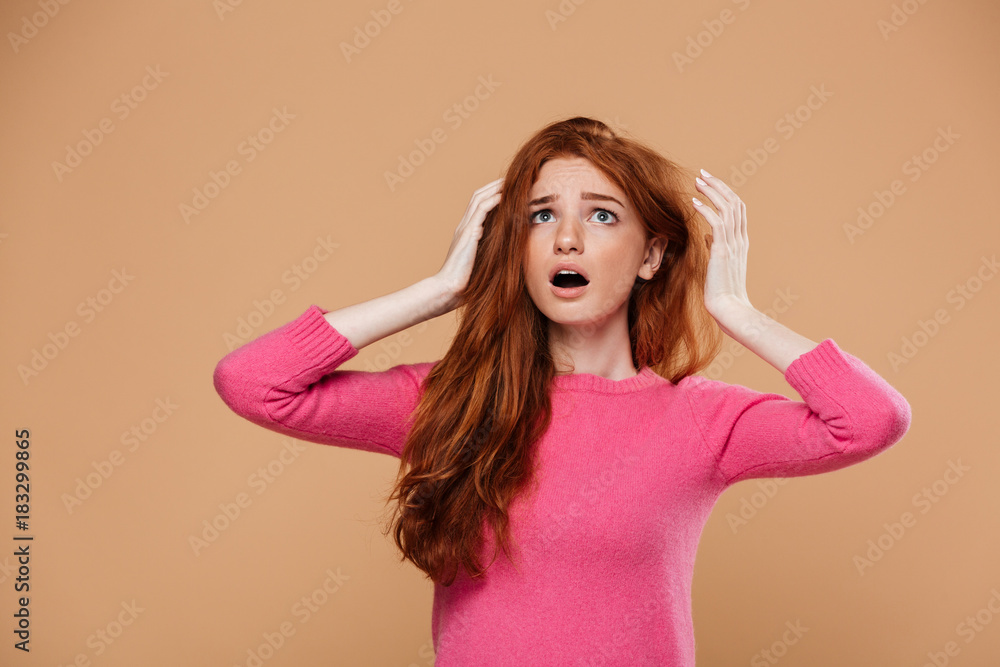 Close up portrait of a shocked young redhead girl Close up portrait of a shocked young redhead girl