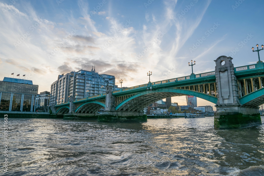 London Southwark bridge in Thames river UK.