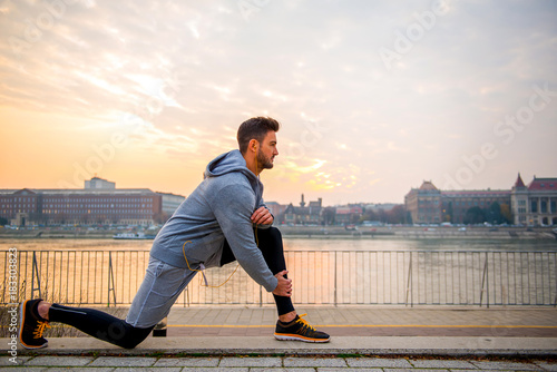 Young man stretching