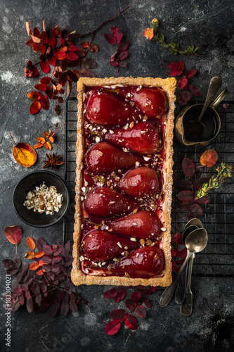 tart with red wine poached pears