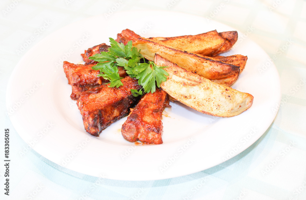 fried potatoes with meat on white background