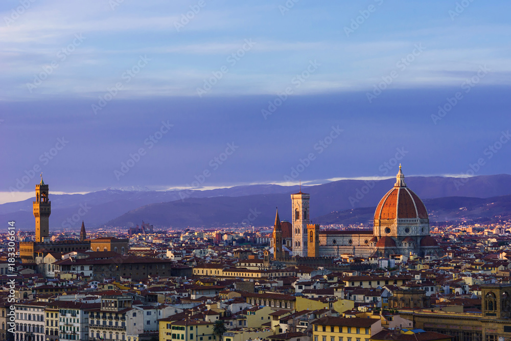 Stunningly beautiful Cathedral of Santa Maria del Fiore in the rays of the setting sun.Scenic view Florence after sunset from Piazzle Michelangelo, Florence,Tuscany,Italy.Beautiful city panorama.